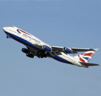British airways airplane flying through blue sky
