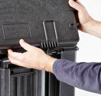 close up of a man opening the top lid of a explorer 5140 tool case
