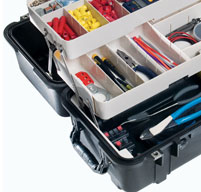 close up of an open peli 1460tool case with the trays full of tools