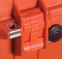 close up of an orange peli 1460ems cases double throw latches