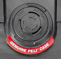 Close up of a yellow peli cases automatic pressure equalization valve which balances pressure and keeps water out.